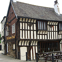 Photo of the exterior of the Old Queens Head in Sheffield an old half timbered building