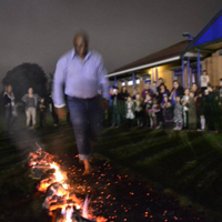 Photogrpah of someone doing a Firewalk