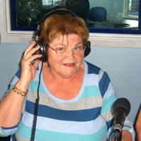 Photograph of Trina presenting radio show
