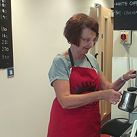 Photograph of cafe volunteer at SRSB