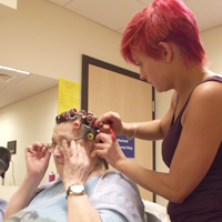 Photograph of client with hairdreser