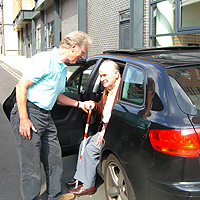 Photograph of an SRSB volunteer driver and client
