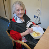 Photograph of SRSB client mixing ingredients