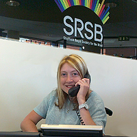 Photograph of SRSB volunteer on reception