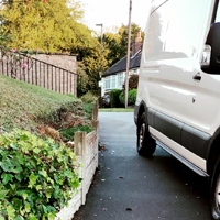 Van parked on a pavement