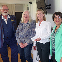 Photo of 3 Rotary members and a staff member rom SRSB