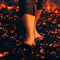 Close up photo of someone fire walking