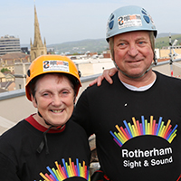 Photo of Mick with his wife at the abseil