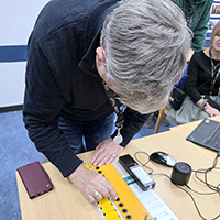 Photo of someone using the McGonagle reader