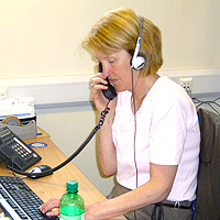 Photo of Gail on the telephone at SRSB