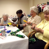 Photograph of clients working on craft activities