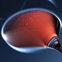 Close up photo of a glass of red wine